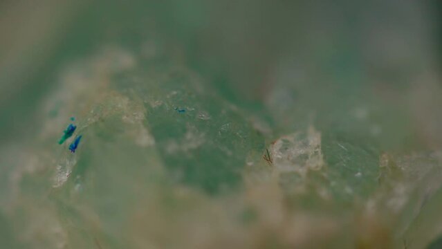 Natural crystal amazonite stone texture rotating abstract background