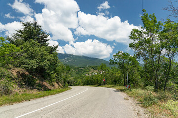 Fototapeta na wymiar An old European road in the mountains along the rocks. Coast of the Black Sea.