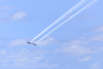Aerobatic Duos: Skyward Spirals of Precision and Thrill