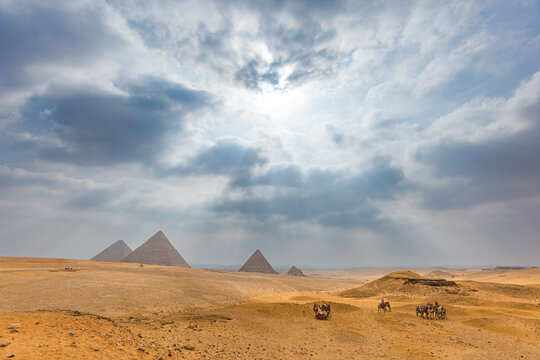 View of The Giza Necropolis, Famed archaeological site featuring the Great Pyramids, the Great Sphinx and The Great Pyramid of Giza in the desert of Giza, Cairo, Egypt.