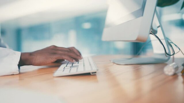 Hands, doctor and typing on keyboard, healthcare and update medical info on hospital database or schedule. Person at computer, medicine and surgeon with research for surgery, health study or results