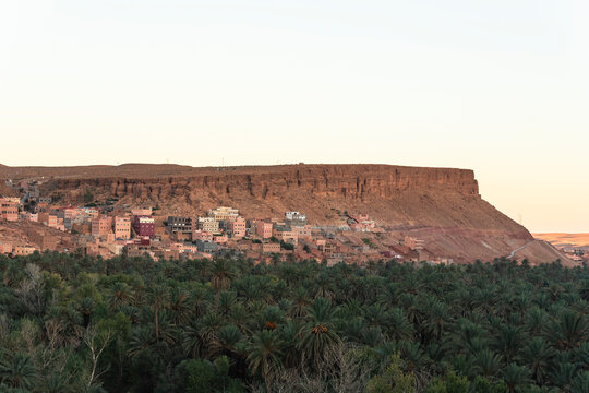 View of the Palmeraie de Tinghir, a valley with palm trees near Ait Ismene village at sunset, Tinghir, Morocco.