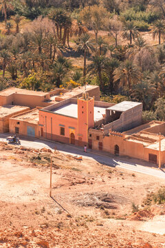 View of berber villages near the Palmeraie, a valley with palm trees along the Ziz Valley with canyon near Errachidia, Morocco.