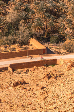 View of berber villages near the Palmeraie, a valley with palm trees along the Ziz Valley with canyon near Errachidia, Morocco.