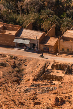 View of berber villages near the Palmeraie, a valley with palm trees along the Ziz Valley with canyon near Errachidia, Morocco.