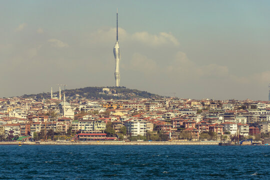 View of the Camilla Tower on the hilltop along the Bosphorus coastline Asiatic side of Istanbul, Turkey.
