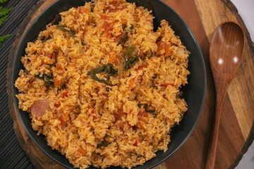 South Indian Breakfast Bliss: Vibrant Tomato Rice Bursting with Flavor. perfectly cooked rice is infused with a delightful blend of tomatoes, aromatic spices, and South Indian flavors