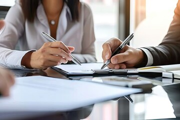 Corporate collaboration. Group of business professionals engaged in productive meeting exchanging handshakes signing important contracts and navigating path to success in dynamic business world