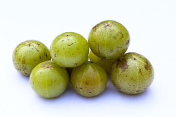 Phyllanthus emblica or Indian gooseberry on white background close-up view 