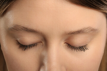 Woman with long eyelashes after mascara applying, closeup