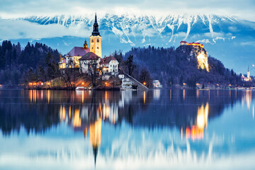 night scenery at Bled lake with church on island . Dramatic , picturesque fall scene. Popular tourist attraction. Bled town, Slovenia, Europe. - obrazy, fototapety, plakaty