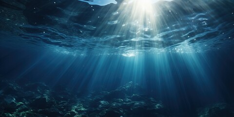 Fototapeta na wymiar Beautiful view of sunlight shining on underwater ocean.