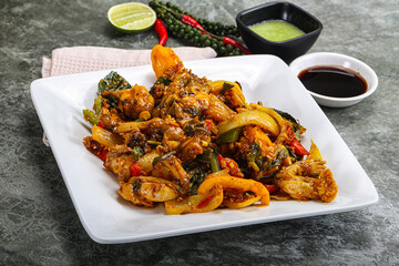 Vietnamese cuisine - fried frog with vegetables