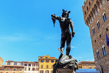 Bronze figure of Perseus by Benvenuto Cellini with the head of Medusa in the Italian Loggia of Lanzi in Florence - 710559406
