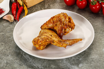 Tasty roasted chicken wing with spices