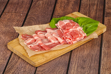 Sliced pork bacon in the bowl