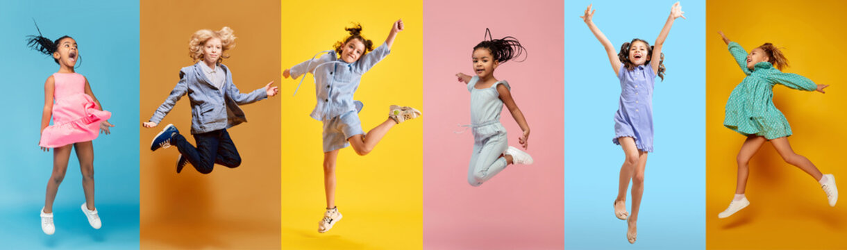 Collage. Children, boys and girls having fun, laughing, jumping over multicolored background. Positive mood. Concept of childhood, emotions, lifestyle, friendship, joy and happiness