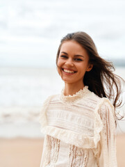 Cheerful Young Woman with Attractive Smile, Enjoying Sunny Summer Vacation on a Beach, Relaxing in the Calm of Nature