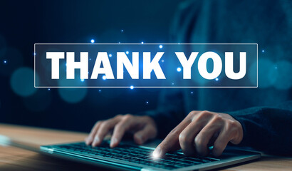 businessman using a laptop and showing the message thank you on a display screen. concept of thank you business, appreciation and gratitude, congratulations, presentation from technology digital