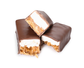 Pieces of tasty chocolate bars with nougat and nuts on white background
