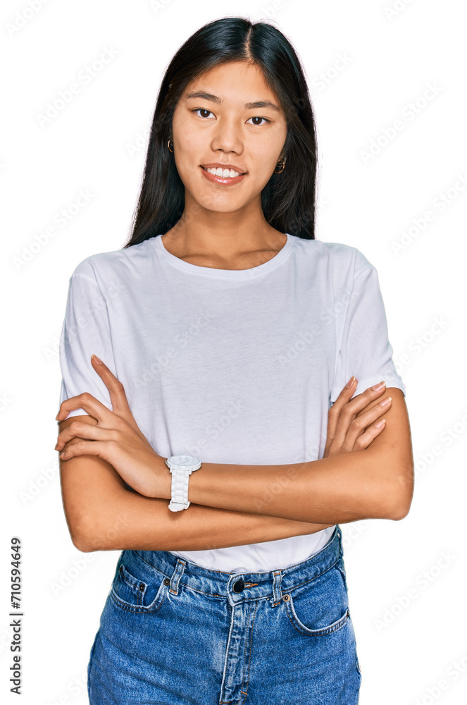 Sticker beautiful young asian woman wearing casual white t shirt happy face smiling with crossed arms lookin