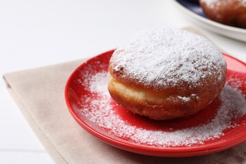 Delicious sweet bun on table, closeup. Space for text