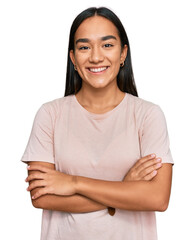 Young asian woman wearing casual clothes happy face smiling with crossed arms looking at the...