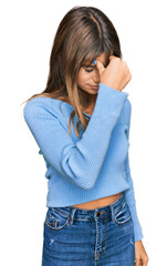 Fototapeta premium Teenager caucasian girl wearing casual clothes tired rubbing nose and eyes feeling fatigue and headache. stress and frustration concept.