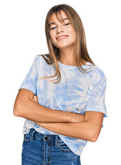 Fototapeta premium Teenager caucasian girl wearing casual clothes happy face smiling with crossed arms looking at the camera. positive person.
