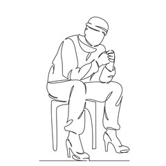 man sitting on a chair in women's shoes