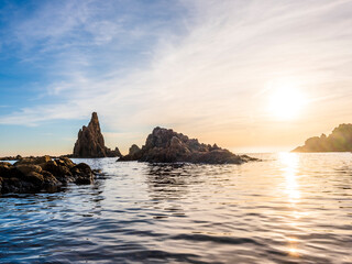 Beautiful Gata Cape landscape with rock formations in the water during sunset in Andalucia, Spain
