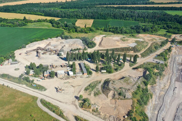 Naklejka premium Extraction of granite. Open cast mine. Stone Quarrying. Granite quarry.