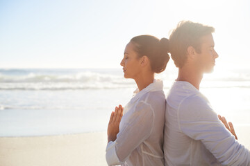 Yoga, meditation and space with couple on beach together for health, wellness or mindfulness in...