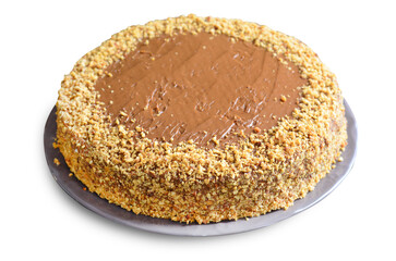 Waffle cake with condensed milk cream and walnuts on White Background