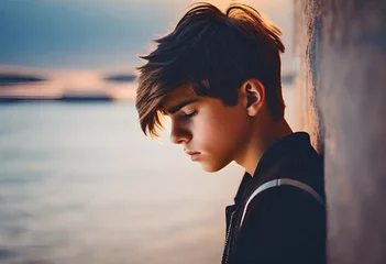 Foto op Plexiglas sad teenager boy on minimal background psychological therapy   © MINIMAL ART