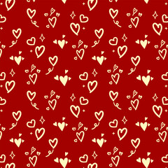 seamless background with yellow hearts on red background