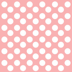 pink background with white polka dots