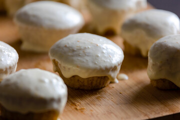 Fototapeta na wymiar Homemade Bliss: Almond Muffins with Orange Glaze Close-Up