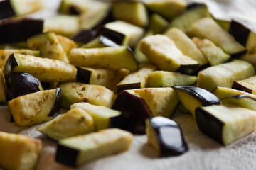 Drying Delights: Cubes of Eggplant on Wooden Board Close-Up