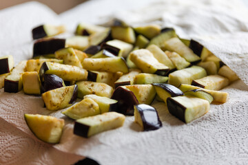 Drying Delights: Cubes of Eggplant on Wooden Board Close-Up