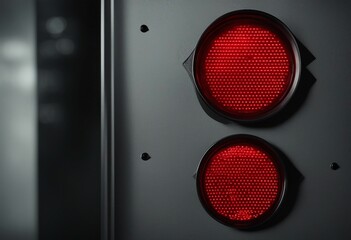 Red alert lamp or warning indicator on black panel glowing Red alert lamp status indicator warning l