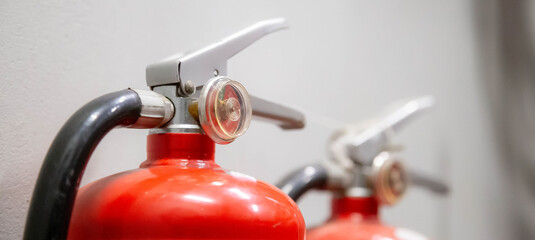 Fire extinguisher on the wall Fire extinguishing system inside the building.