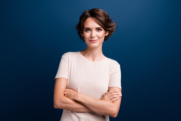 Portrait photo of adorable young girl business manager entrepreneur hold arms folded isolated on...