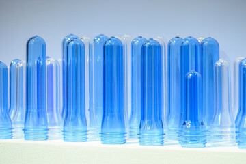 Close up scene of group of preform shape of PET bottle products.