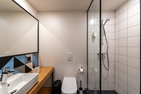 Clean modern bathroom. Bathroom interior in luxury home with glass shower