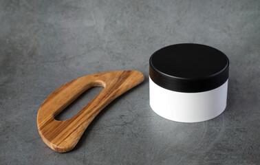 face massager guasha and skin care lotion