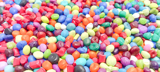 Fototapeta na wymiar Colorful polymer masterbatch granules isolated on white background