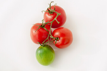 Red cherry tomatoes on a white background isolated on a white background