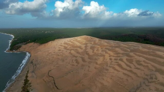 Aerial view of sand dunes along the coastline at Dune of Pilat, France.