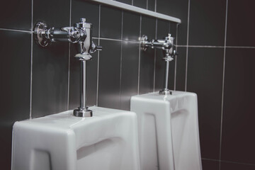 plumber at work in a bathroom, plumbing repair service , fix water plumbing leaks, replace the kitchen sink drain